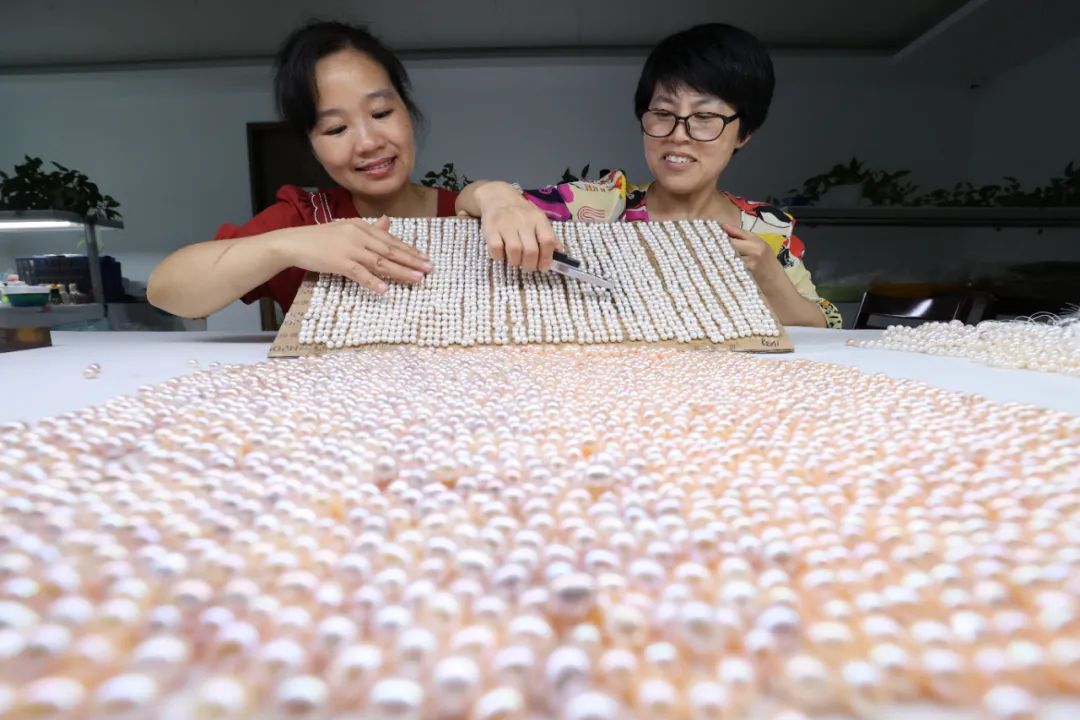 中国首个水产养殖世界级农业文化遗产_浙江省渔业农产品_浙江德清淡水珍珠复合养殖系统